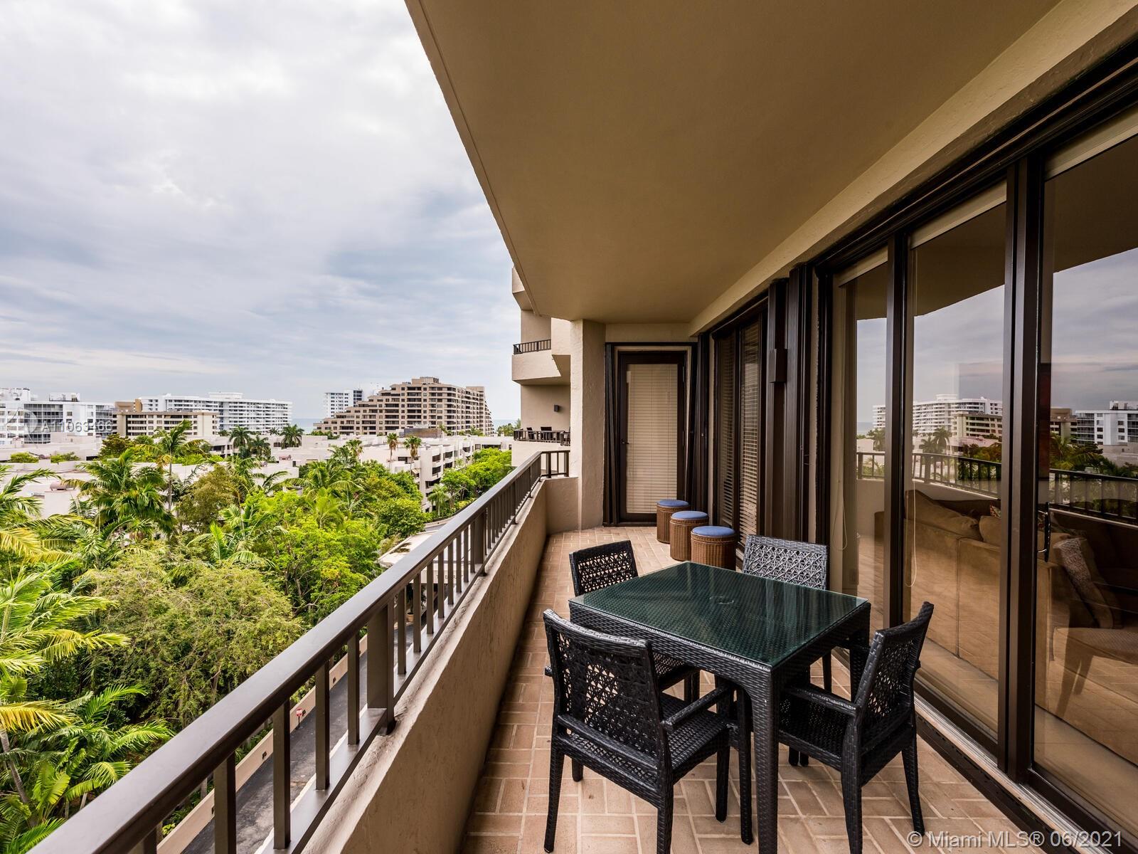 151 Crandon Boulevard, Unit 736 Key Biscayne, FL 33149 - Photo 24 of 38 a view of balcony with furniture