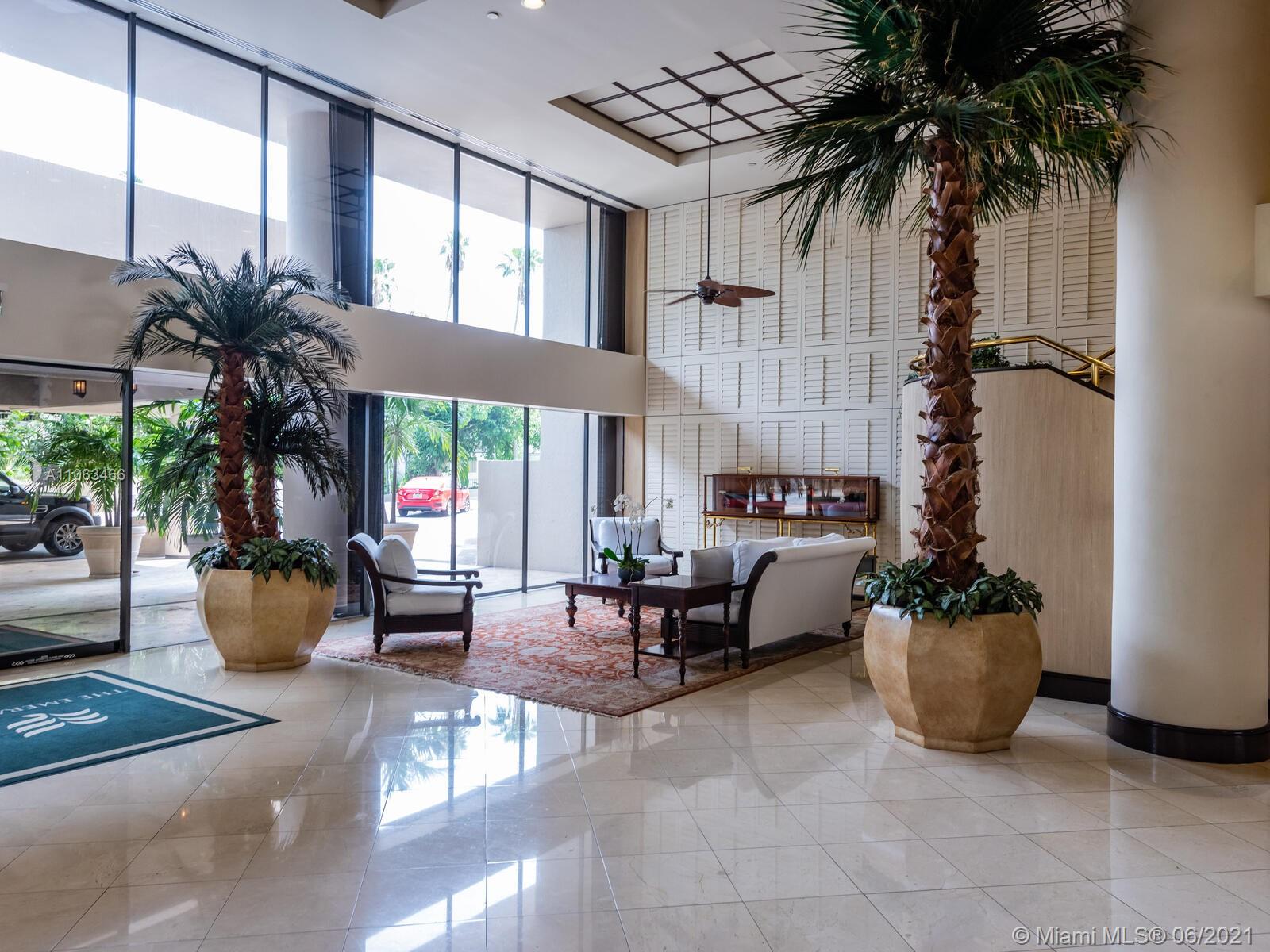 151 Crandon Boulevard, Unit 736 Key Biscayne, FL 33149 - Photo 4 of 38 a living room with furniture and a potted plant