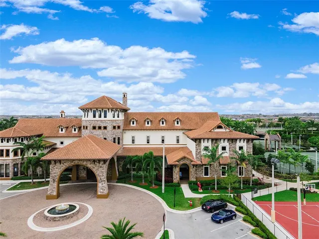 a view of a patio with a table and chairs