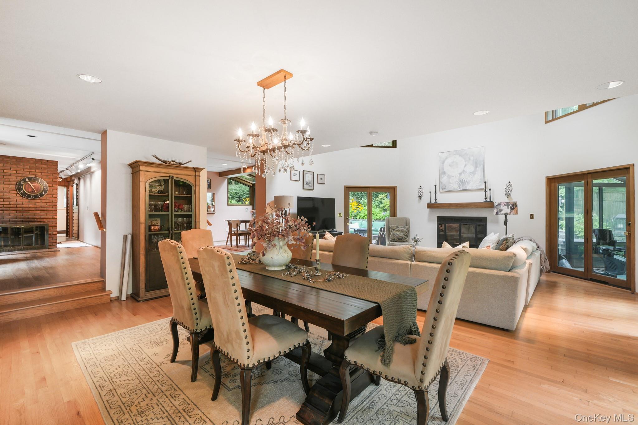155 Revolutionary Road Briarcliff Manor, NY 10510 - Photo 15 of 30 a view of a dining room with furniture window and wooden floor
