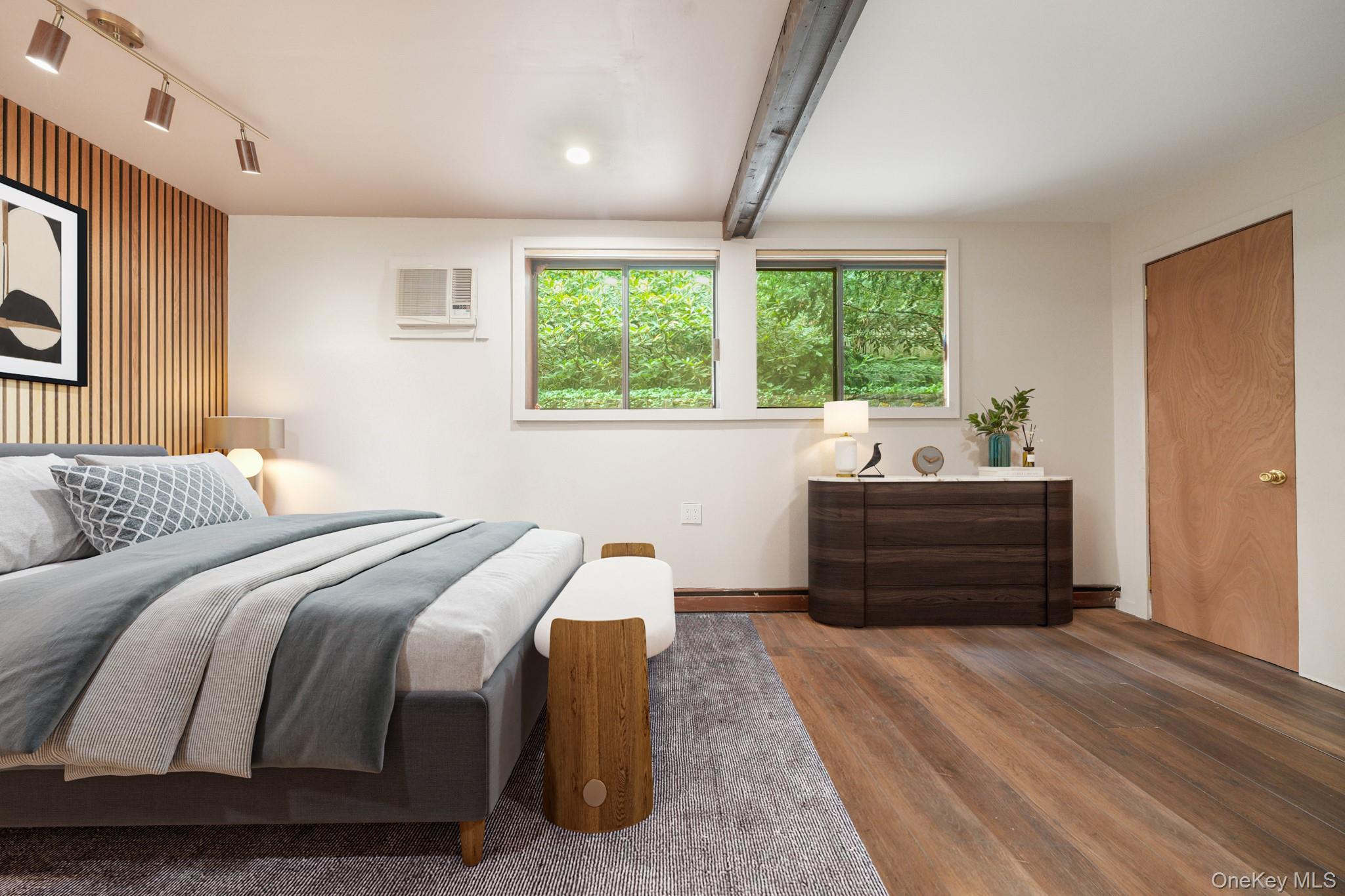 155 Revolutionary Road Briarcliff Manor, NY 10510 - Photo 17 of 30 a bedroom with a bed and a window