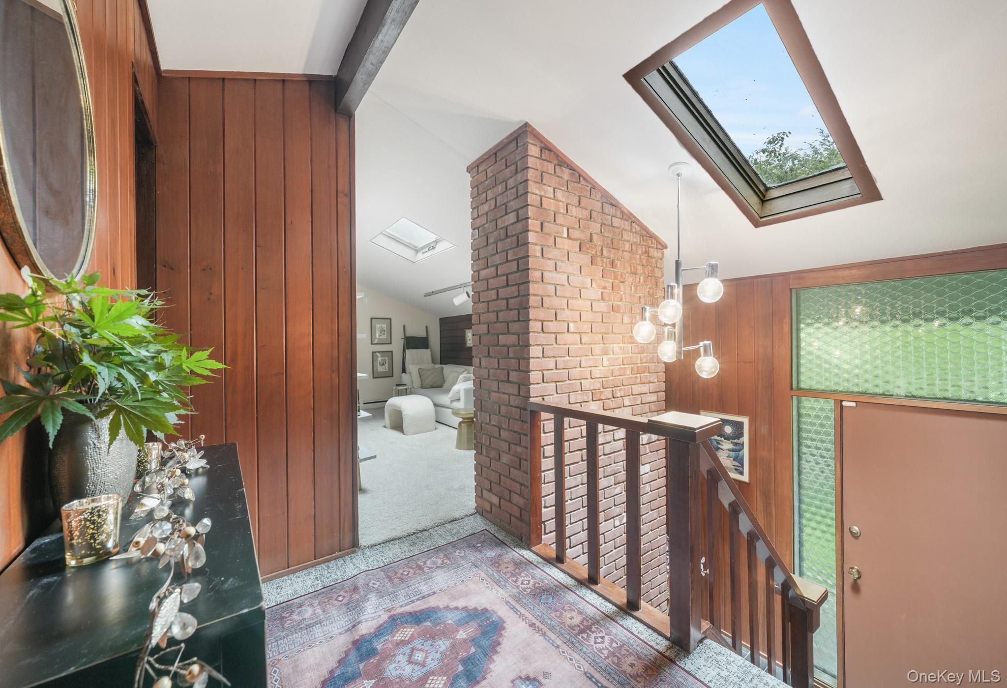 155 Revolutionary Road Briarcliff Manor, NY 10510 - Photo 19 of 30 a view of entryway with wooden floor and a potted plant