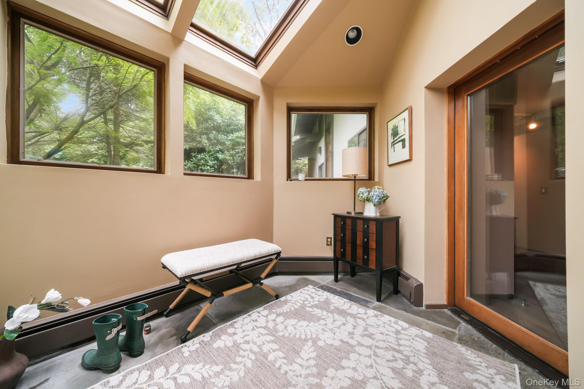 155 Revolutionary Road Briarcliff Manor, NY 10510 - Photo 2 of 30 a living room with furniture and a window