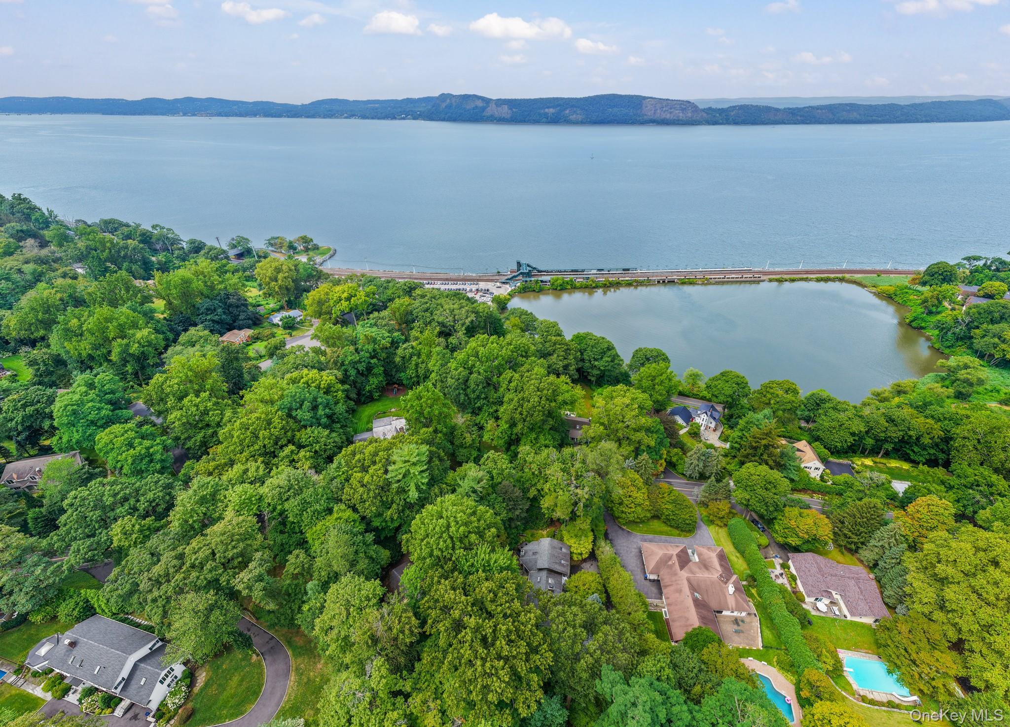 155 Revolutionary Road Briarcliff Manor, NY 10510 - Photo 27 of 30 a view of a lake with a lake