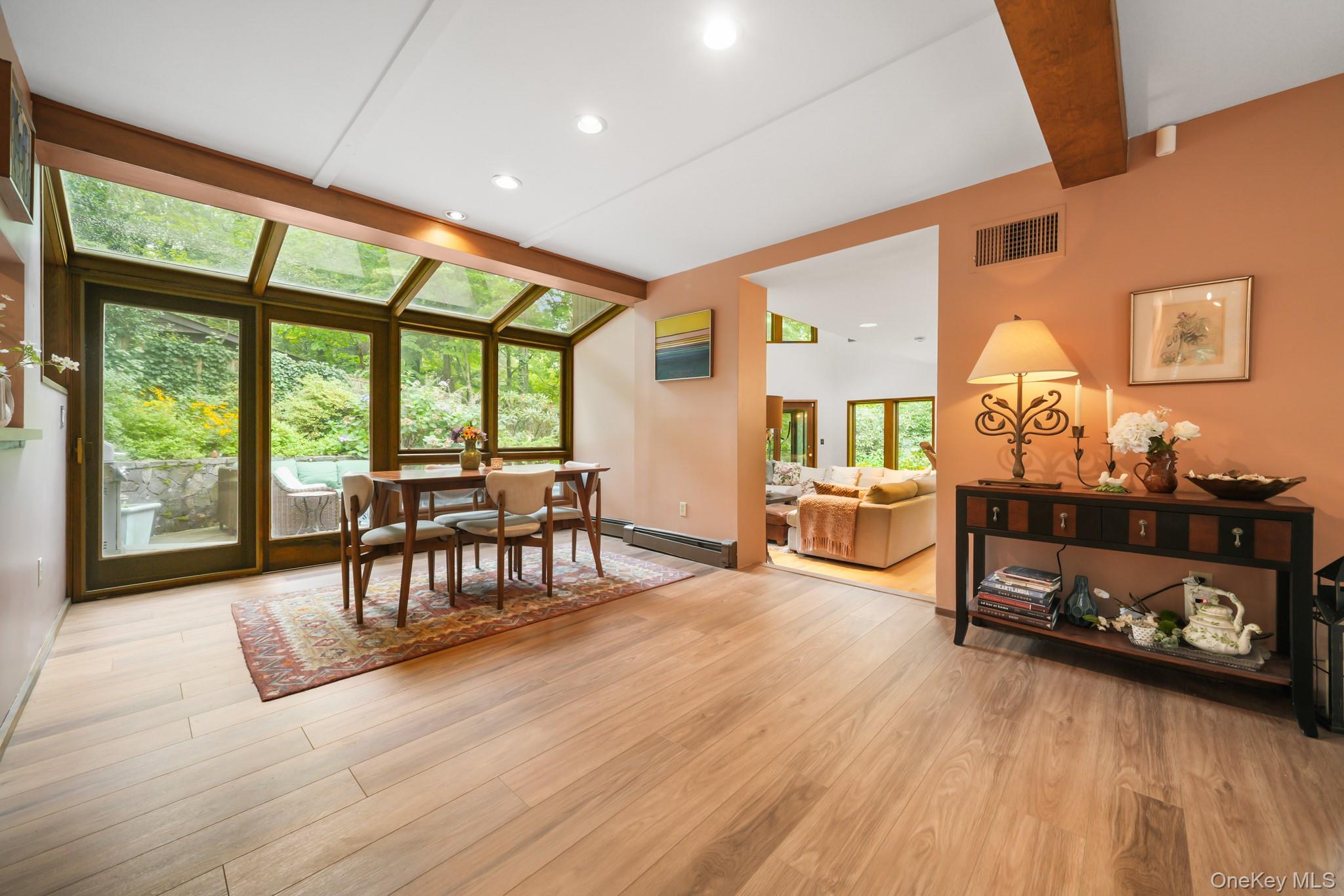 155 Revolutionary Road Briarcliff Manor, NY 10510 - Photo 5 of 30 a bedroom with furniture and a wooden floor