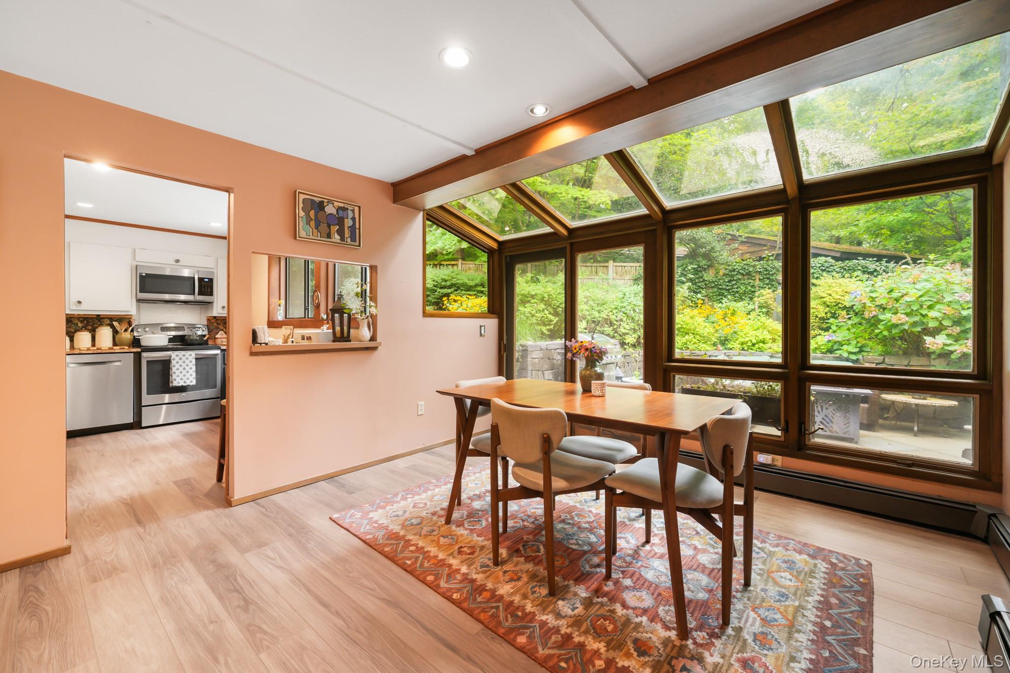 155 Revolutionary Road Briarcliff Manor, NY 10510 - Photo 7 of 30 a dining room with furniture and wooden floor