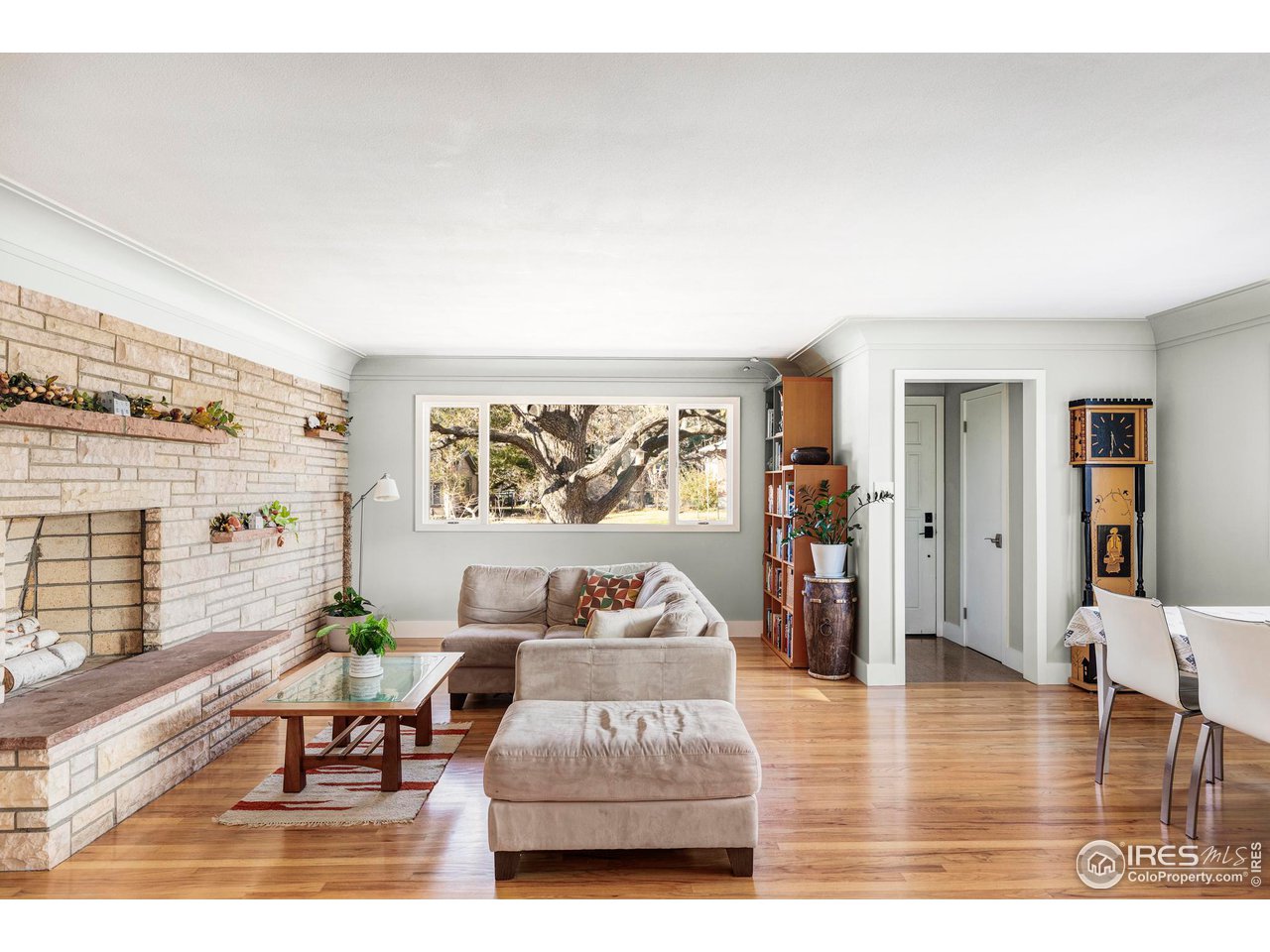 2870 15th Street Boulder, CO 80304 - Photo 4 of 21 The front of the home features breathtaking west-facing views of the Boulder Foothills with potential upper-level Flatirons views and an amazing shade tree.