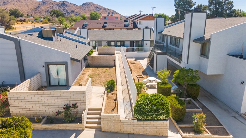 19087 Allegheny Road Apple Valley, CA 92307 - Photo 13 of 47 aerial view of a house with a yard
