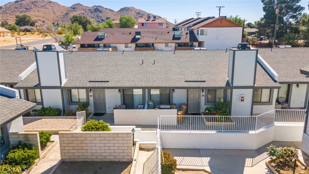 19087 Allegheny Road Apple Valley, CA 92307 - Photo 14 of 47 an aerial view of a house with a yard