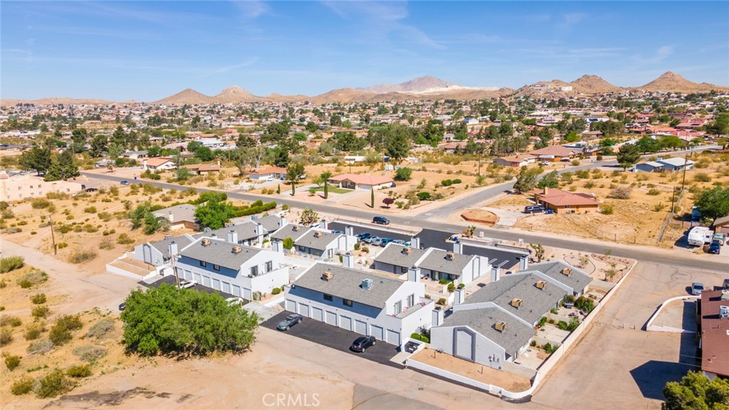 19087 Allegheny Road Apple Valley, CA 92307 - Photo 17 of 47 an aerial view of residential houses with outdoor space