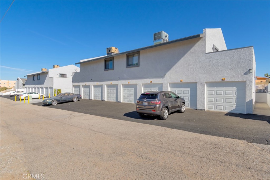 19087 Allegheny Road Apple Valley, CA 92307 - Photo 32 of 47 a car parked in front of a house