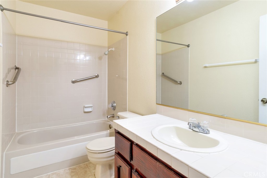 19087 Allegheny Road Apple Valley, CA 92307 - Photo 41 of 47 a bathroom with a sink a toilet and shower