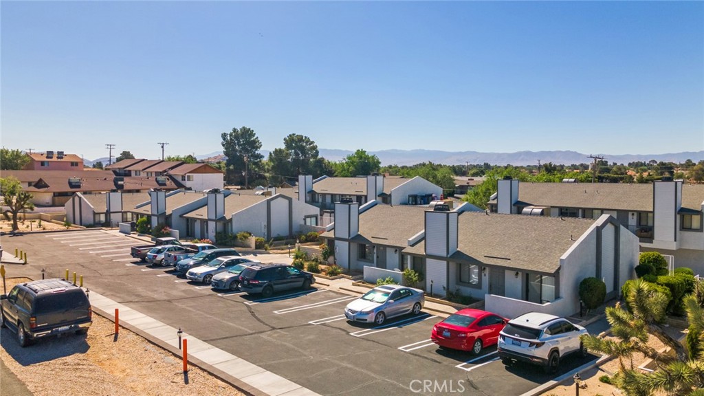 19087 Allegheny Road Apple Valley, CA 92307 - Photo 6 of 47 a view of a terrace with chairs and couches