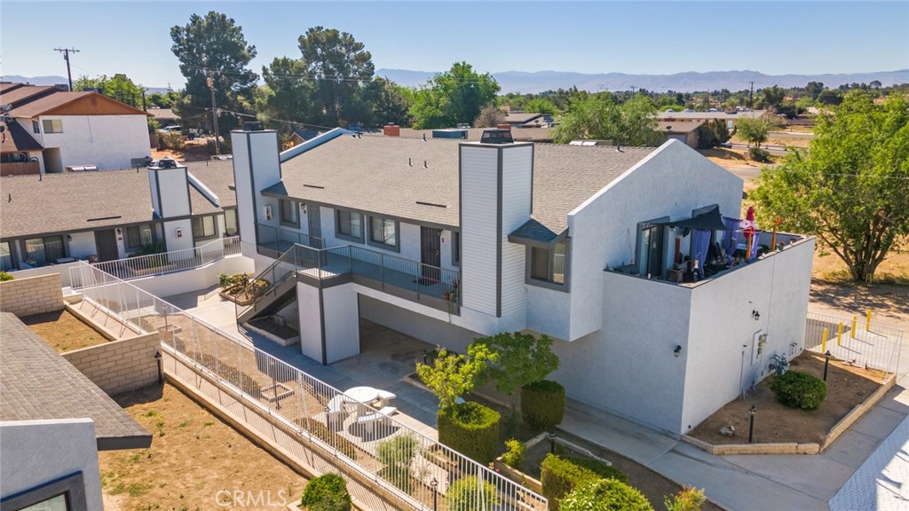 19087 Allegheny Road Apple Valley, CA 92307 - Photo 8 of 47 an aerial view of a house with large trees