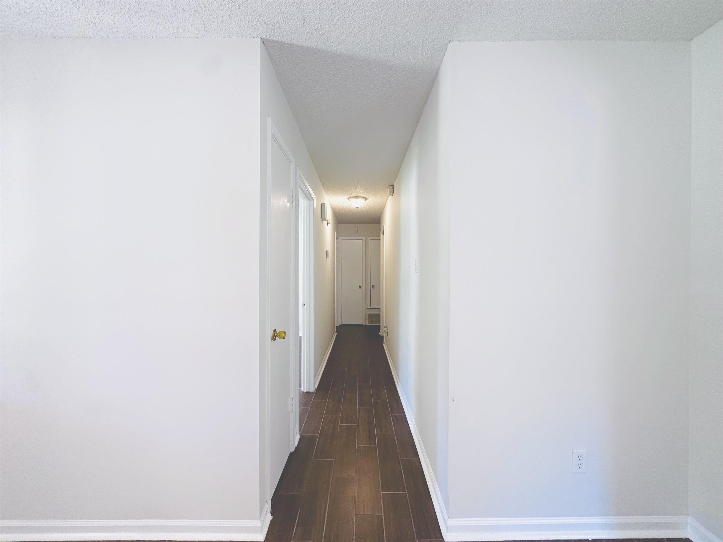 4192 Riche Road Memphis, TN 38128 - Photo 17 of 32 a view of a hallway with wooden floor