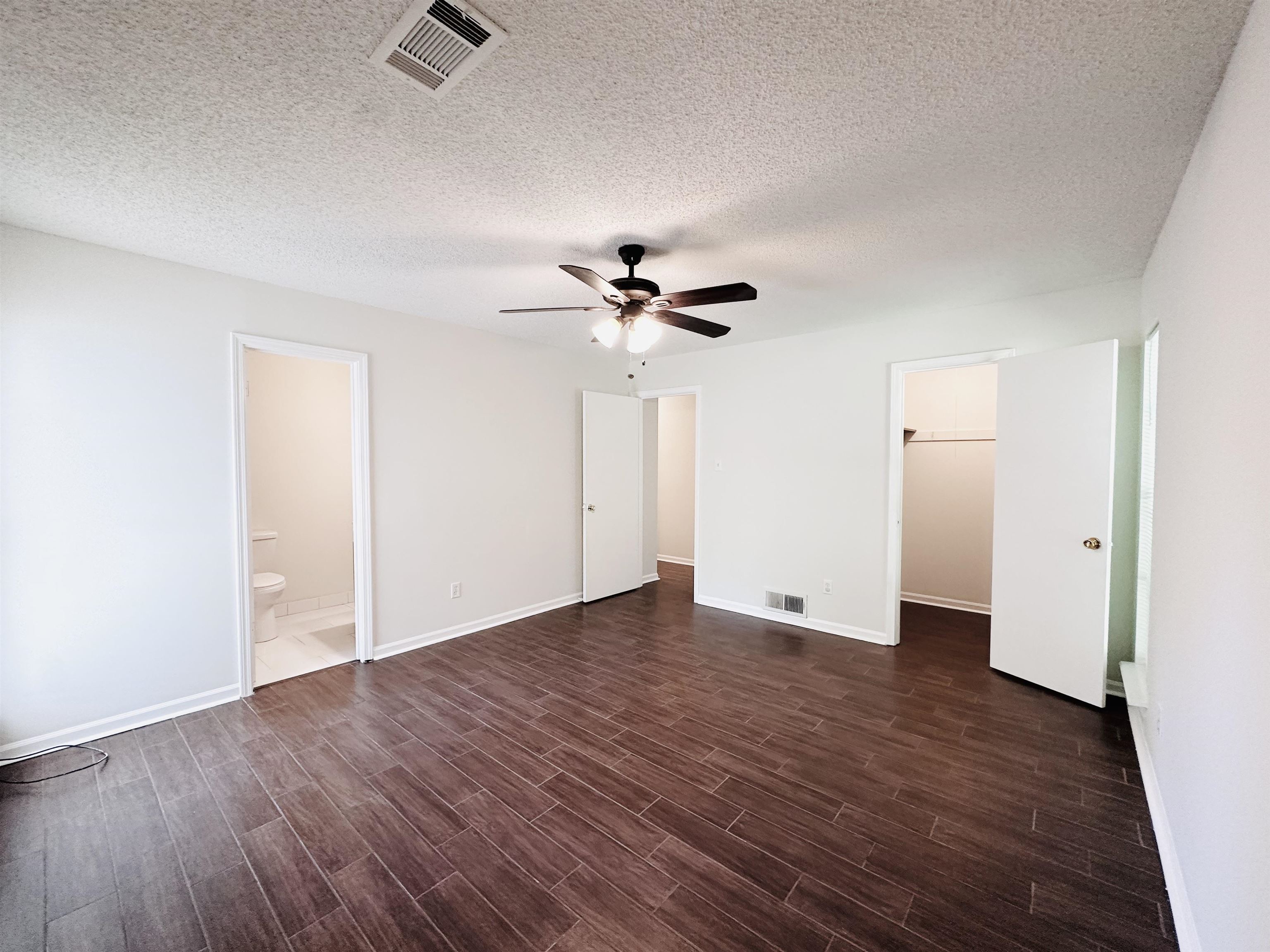 4192 Riche Road Memphis, TN 38128 - Photo 19 of 32 wooden floor in an empty room with a window