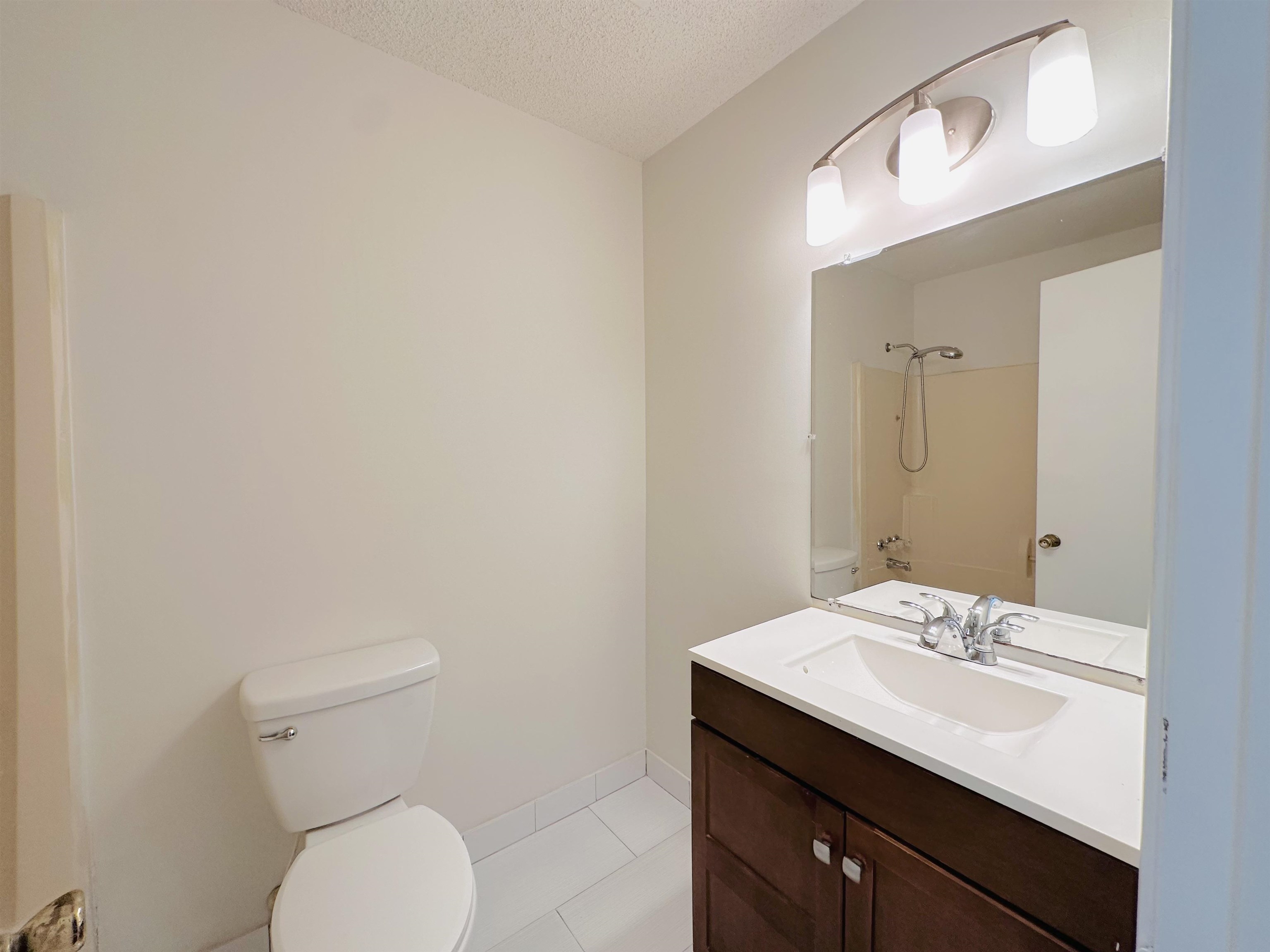 4192 Riche Road Memphis, TN 38128 - Photo 20 of 32 a bathroom with a sink a toilet and mirror