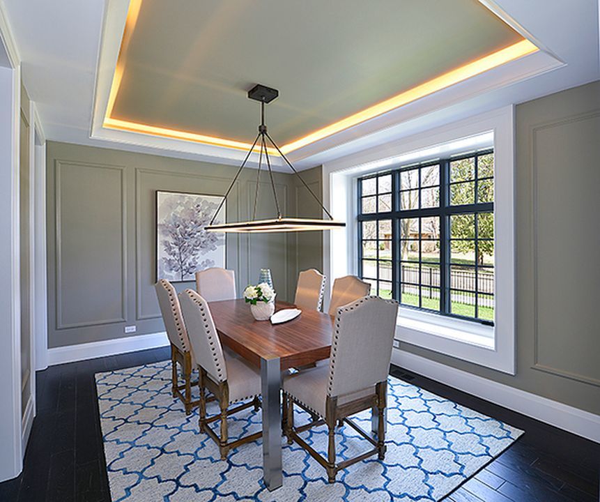 330 Brookside Lane Glencoe, IL 60022 - Photo 15 of 40 a dining room with furniture a chandelier and wooden floor