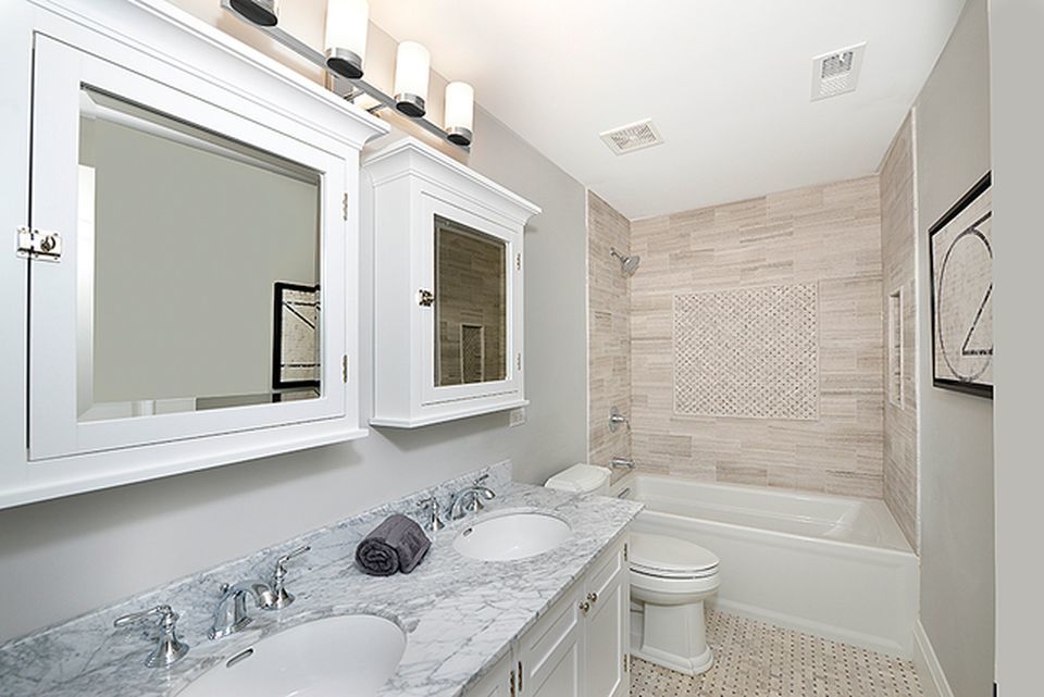 330 Brookside Lane Glencoe, IL 60022 - Photo 24 of 40 a bathroom with a granite countertop sink toilet mirror and shower