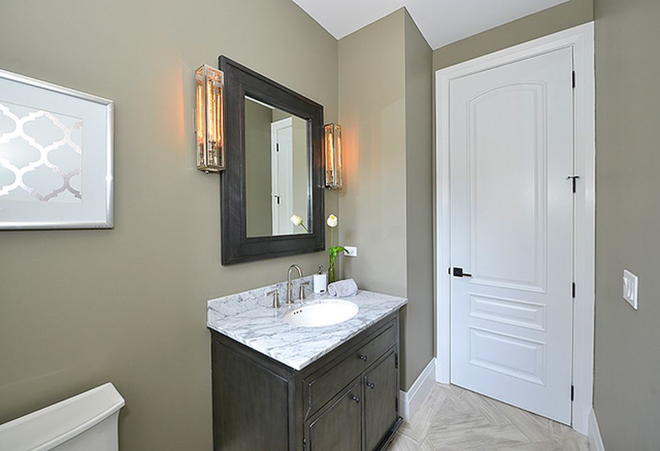 330 Brookside Lane Glencoe, IL 60022 - Photo 35 of 40 a bathroom with a sink and a mirror