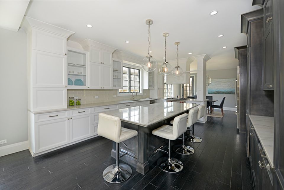 330 Brookside Lane Glencoe, IL 60022 - Photo 8 of 40 a large kitchen with a table and chairs