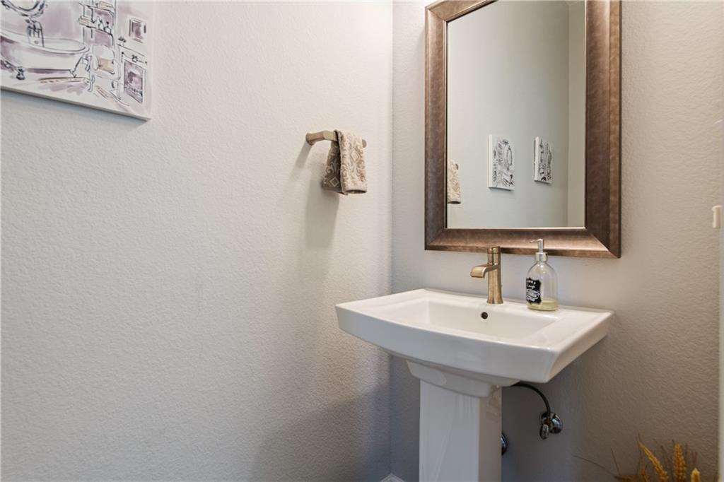 7117 Jument Drive Austin, TX 78738 - Photo 28 of 40 Bathroom featuring a sink