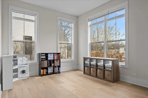 a view of workspace with furniture and window