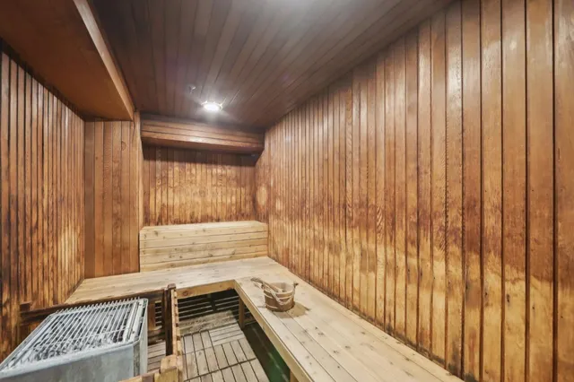 a bathroom with a bathtub and shower