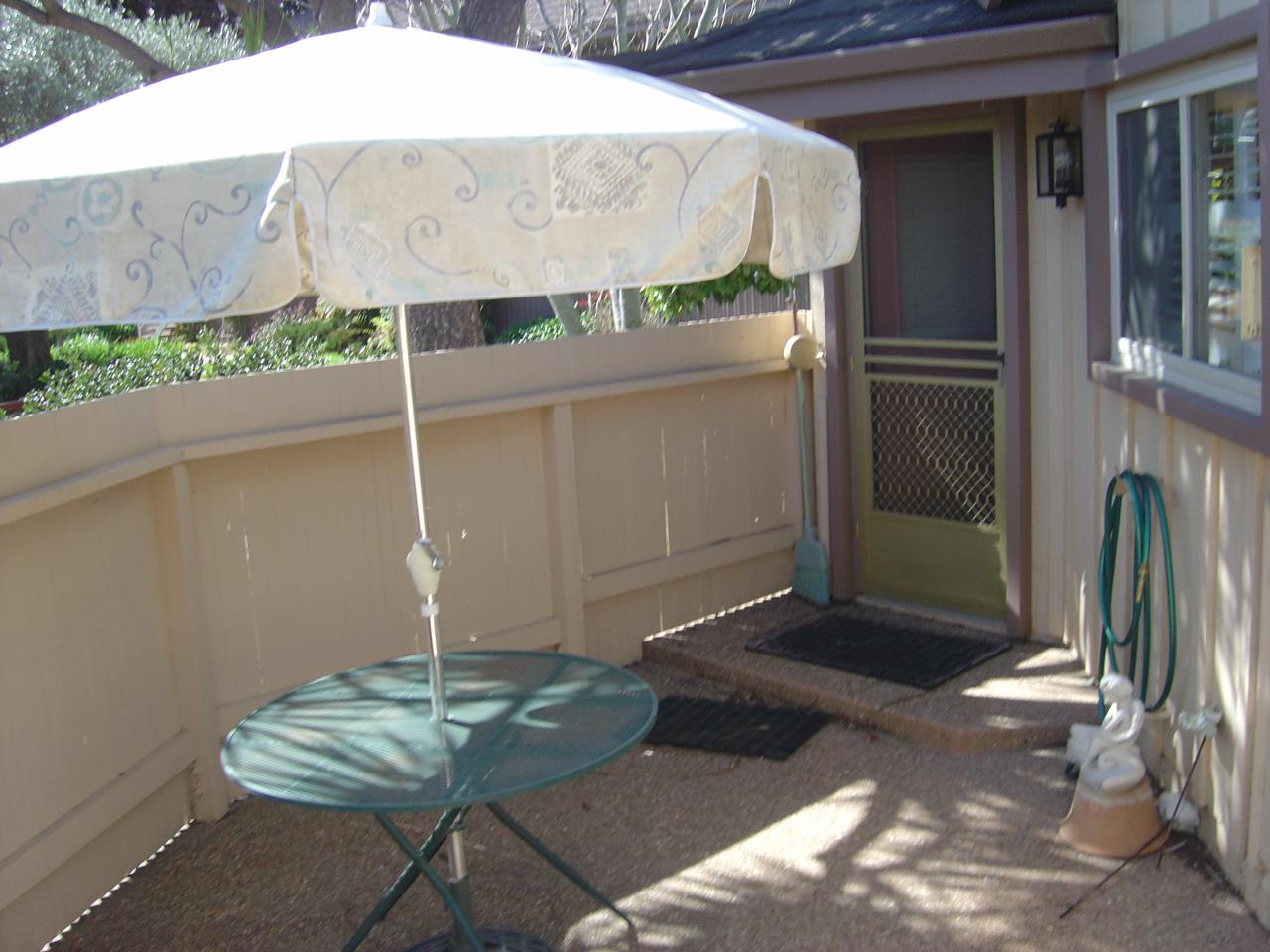 5726 Encina Road, Unit 3 Santa Barbara, CA 93117 - Photo 10 of 26 a table with some potted plants