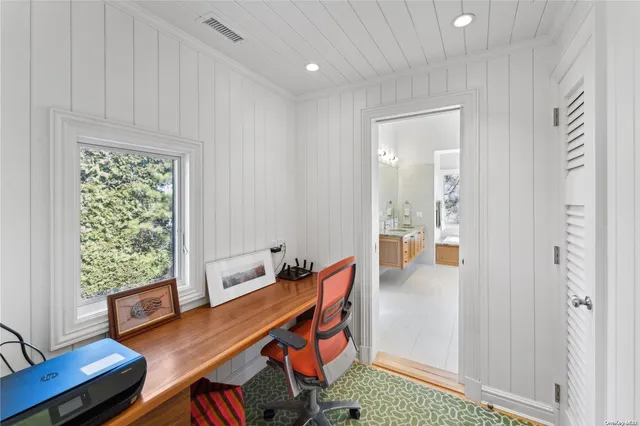 a room with furniture and window