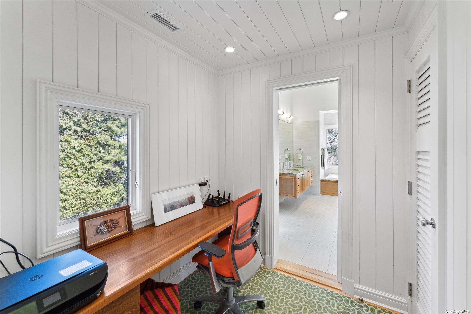 32 Tuthill Lane Remsenburg, NY 11960 - Photo 11 of 32 a room with furniture and window