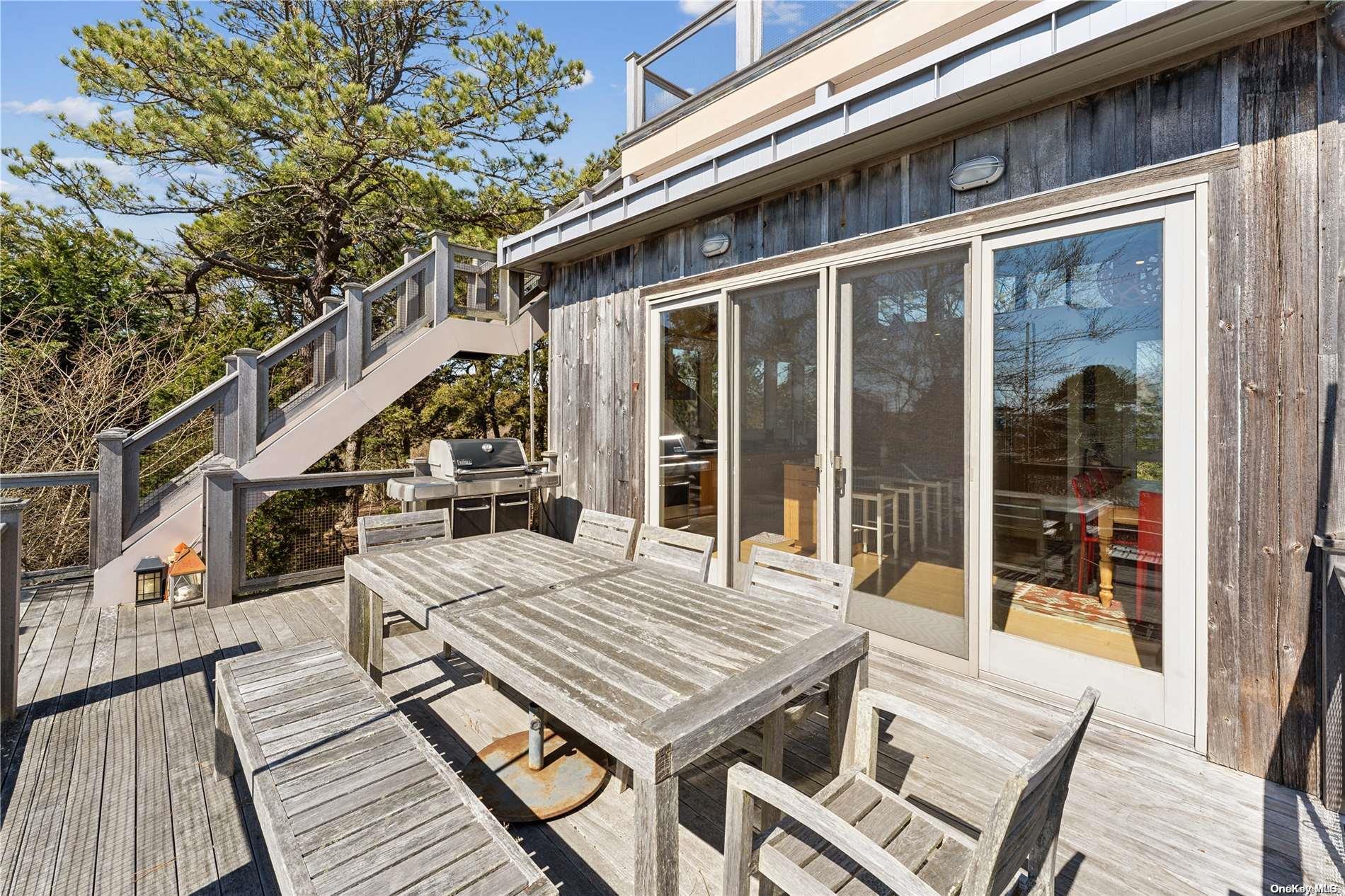 32 Tuthill Lane Remsenburg, NY 11960 - Photo 24 of 32 a view of deck with patio