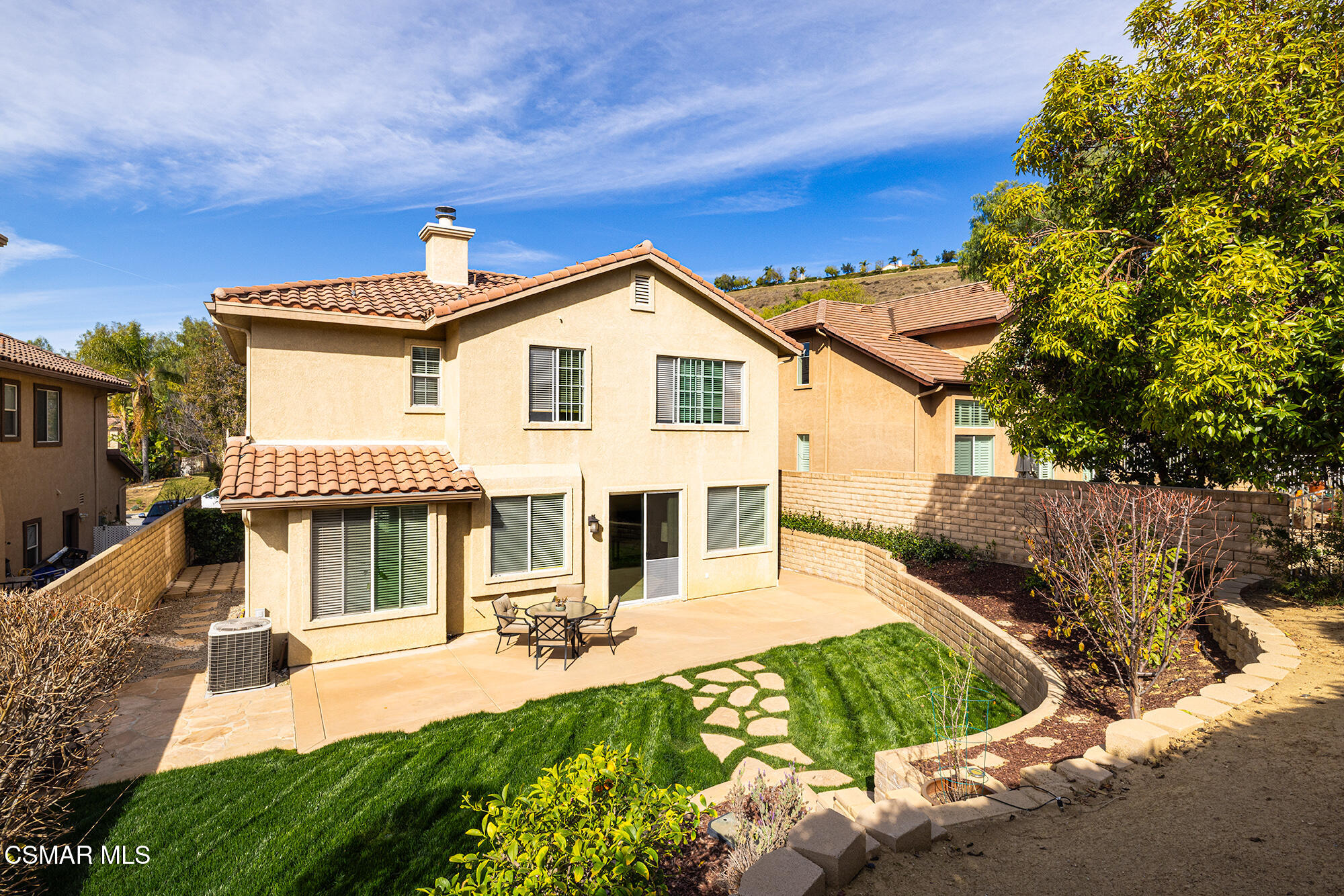 2684 Sunshine Valley Court Simi Valley, CA 93063 - Photo 1 of 38 a front view of a house with garden