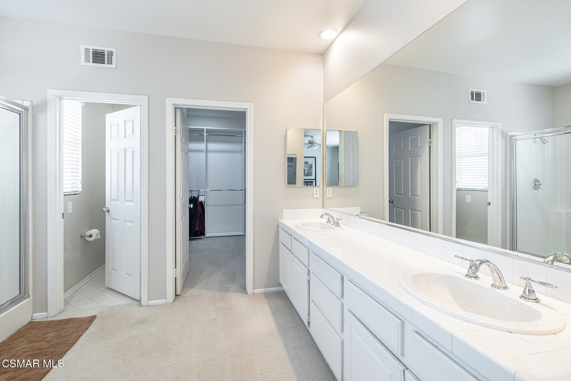 2684 Sunshine Valley Court Simi Valley, CA 93063 - Photo 11 of 38 a spacious bathroom with a double vanity sink mirror and shower