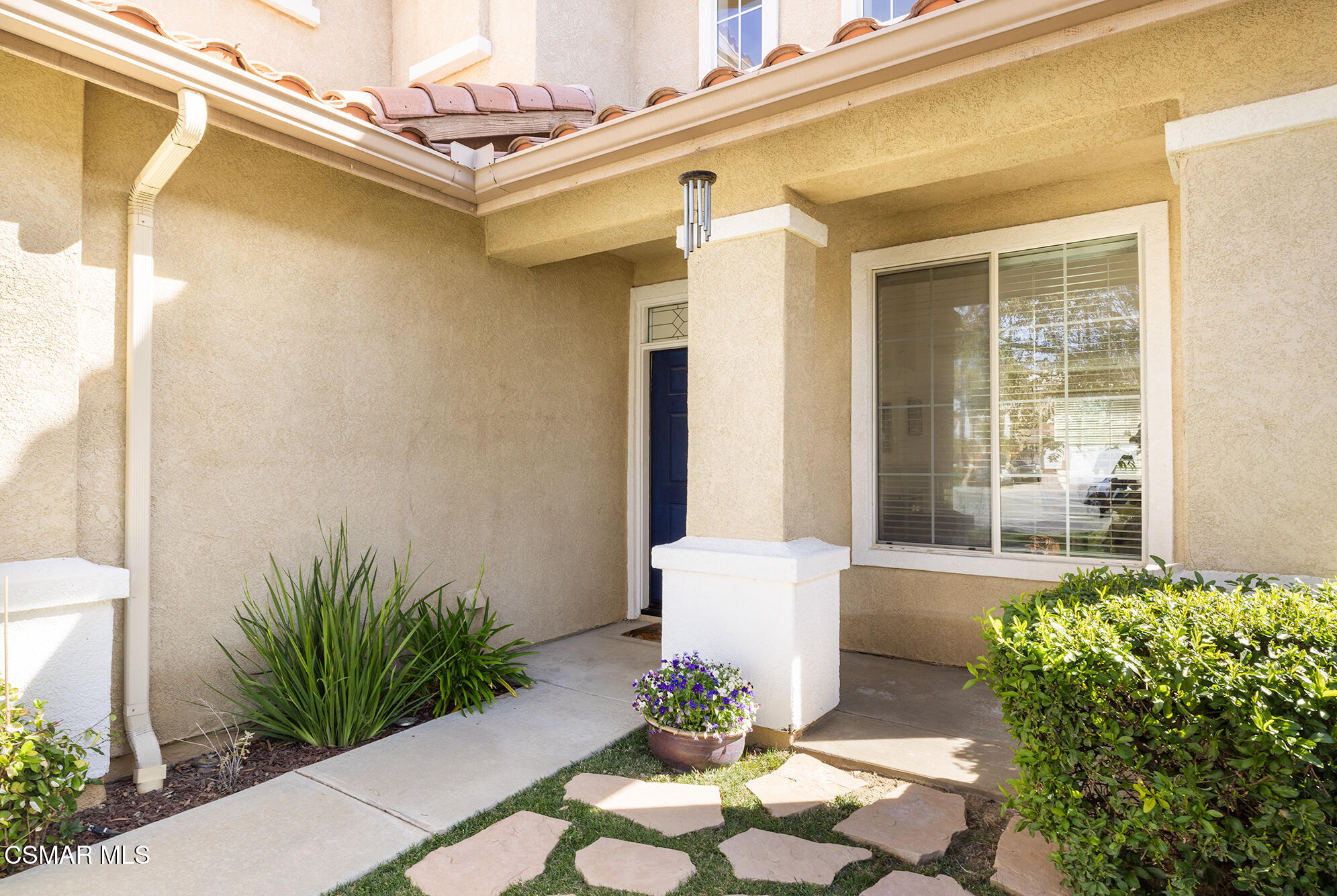 2684 Sunshine Valley Court Simi Valley, CA 93063 - Photo 20 of 38 a front view of a house with a yard