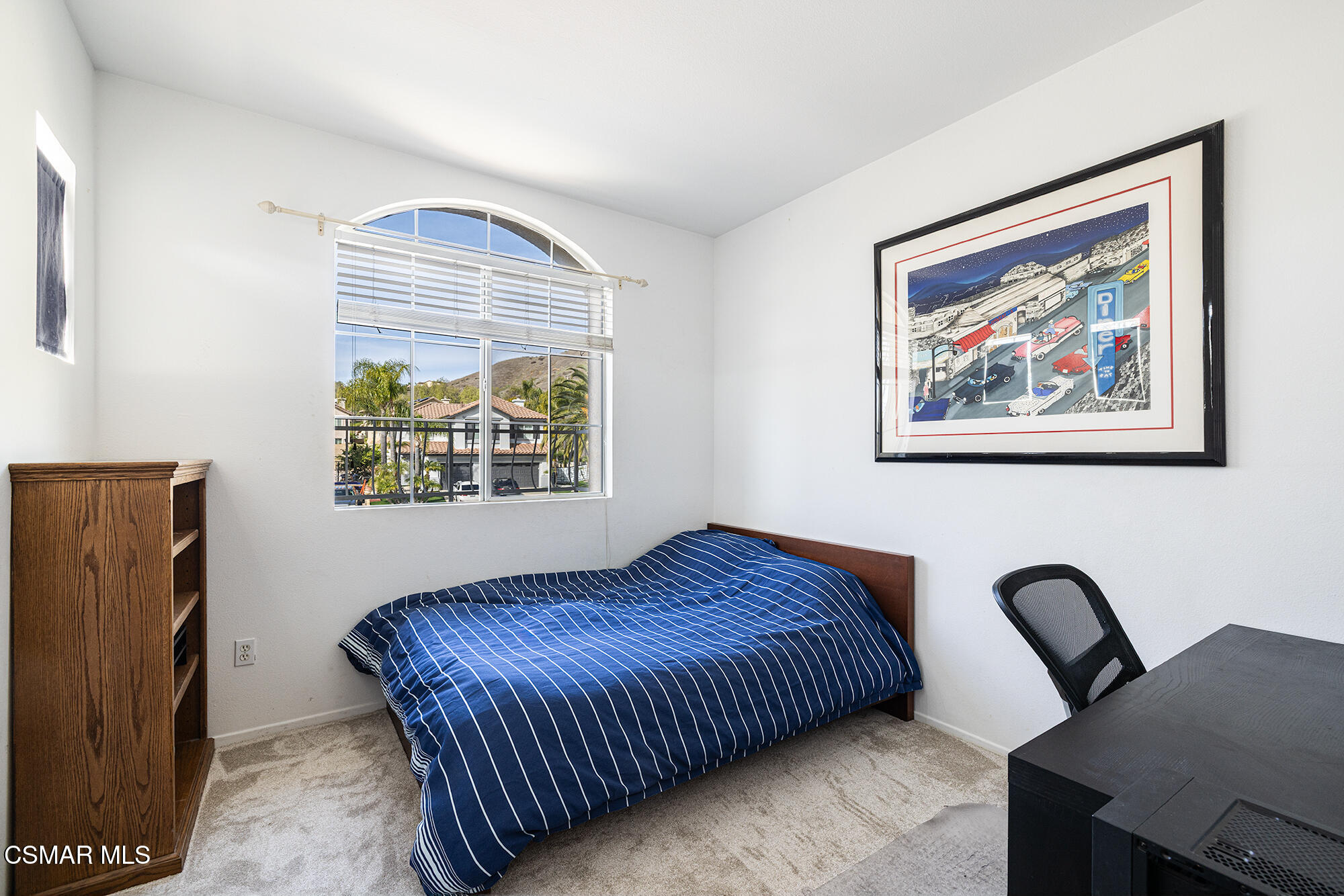 2684 Sunshine Valley Court Simi Valley, CA 93063 - Photo 32 of 38 a bedroom with a bed and a painting on the wall