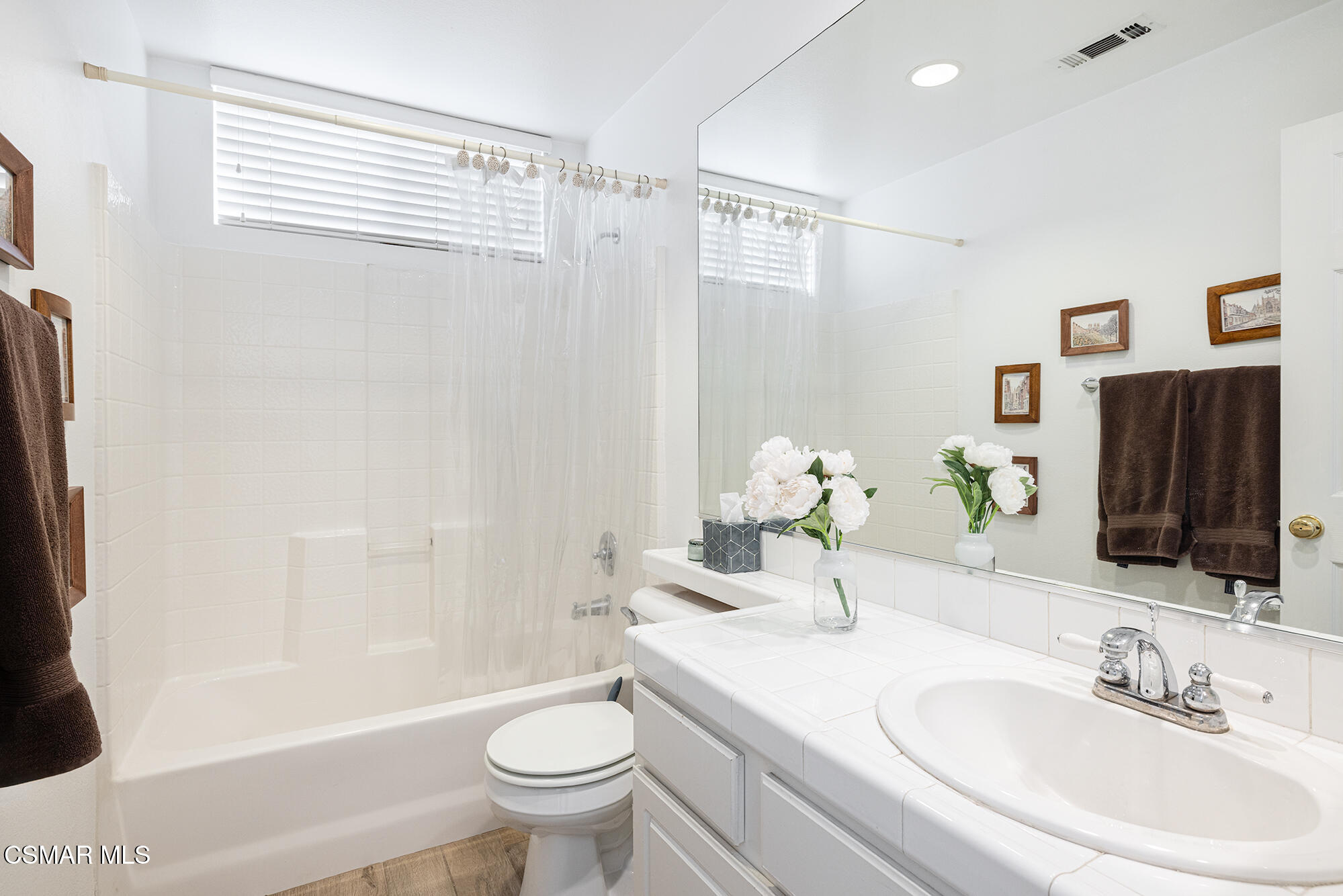 2684 Sunshine Valley Court Simi Valley, CA 93063 - Photo 7 of 38 a bathroom with a sink toilet and shower