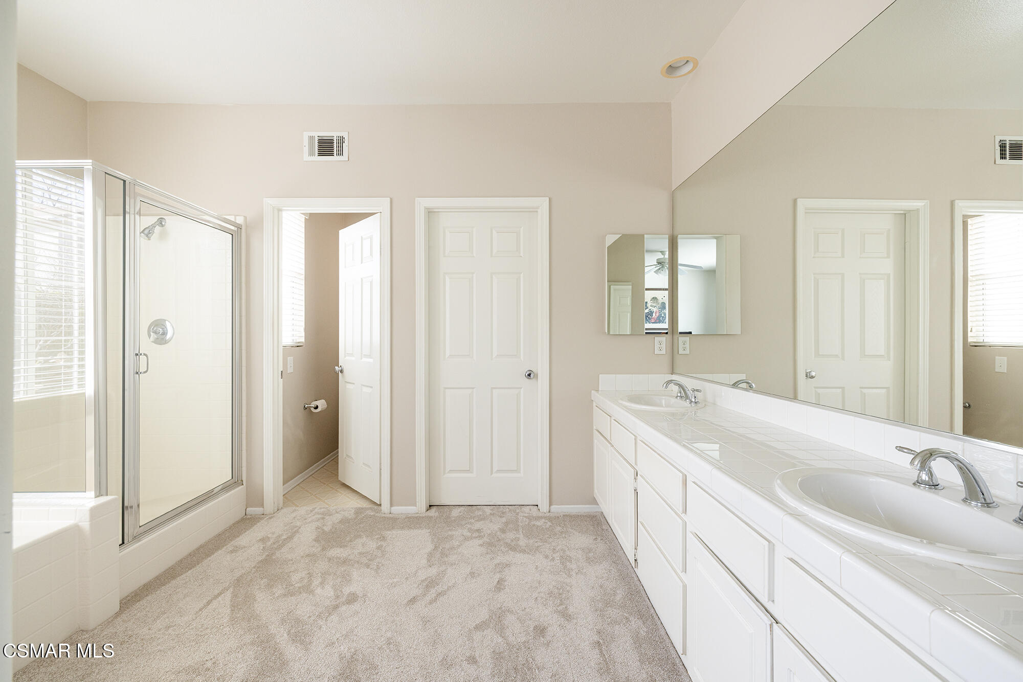 2684 Sunshine Valley Court Simi Valley, CA 93063 - Photo 9 of 38 a spacious bathroom with a double vanity sink and mirror