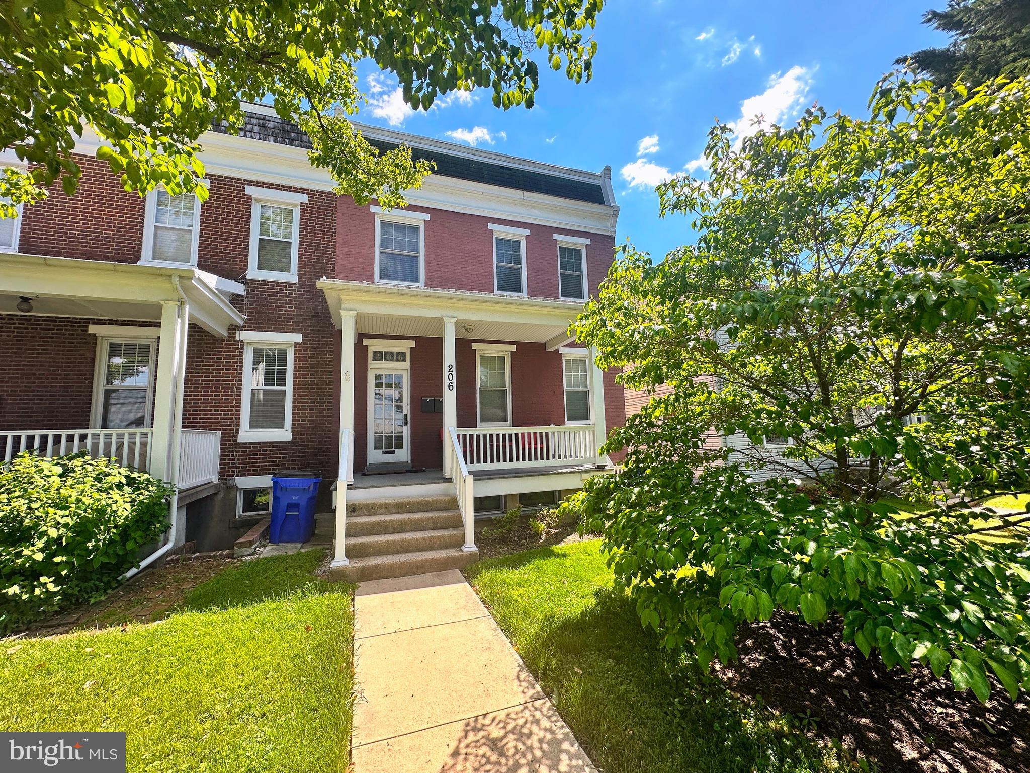 206 East 8th Street, Unit 2 Frederick, MD 21701 - Photo 1 of 10 a front view of a house with a yard