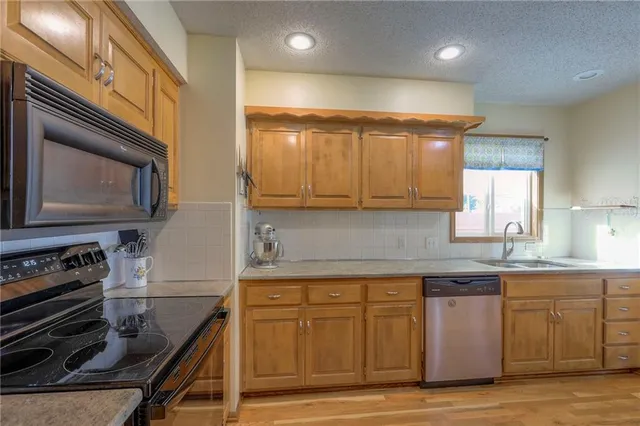 $330,000 | 1053 Southwest 8th Circle, Lee's Summit, MO 64081