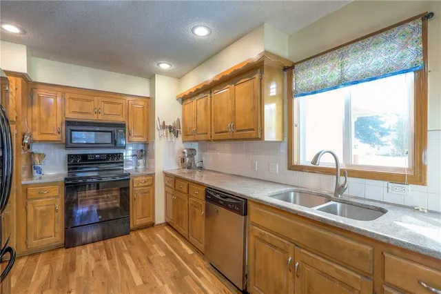 $330,000 | 1053 Southwest 8th Circle, Lee's Summit, MO 64081