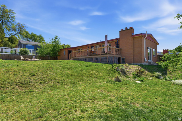 935 900 North Bountiful, UT 84010 - Photo 38 of 46 Back of house featuring a deck and brick siding