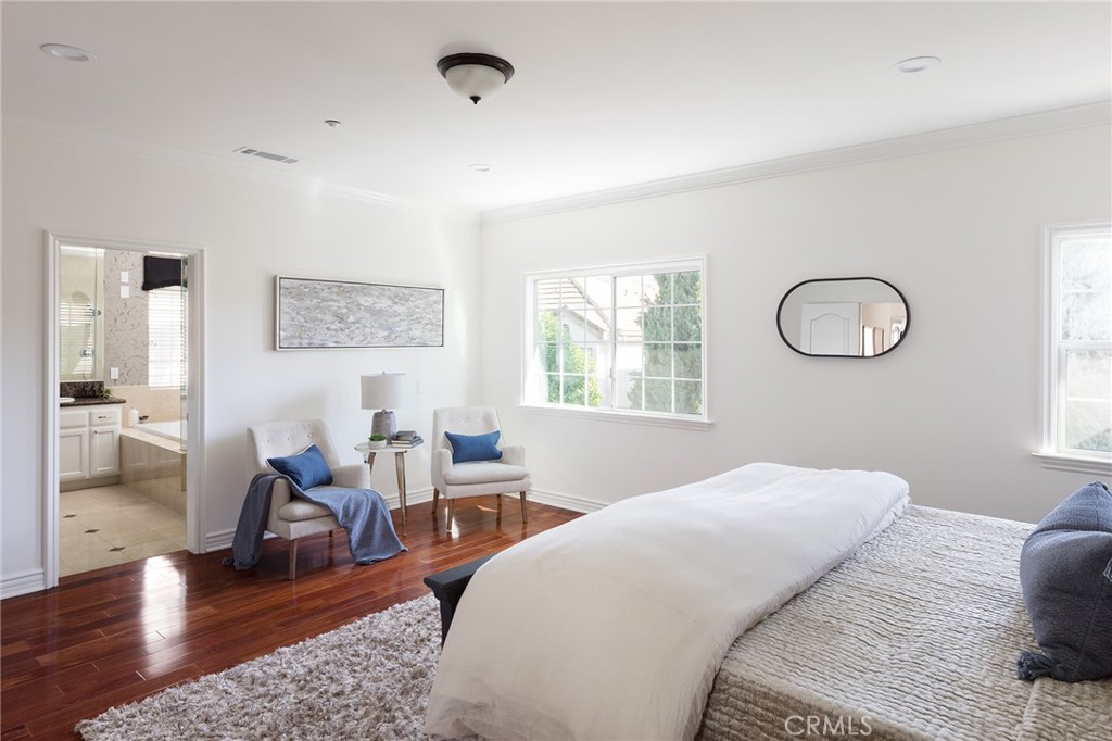 525 Fifth Avenue, Unit B Arcadia, CA 91006 - Photo 7 of 12 a bedroom with a bed and wooden floor