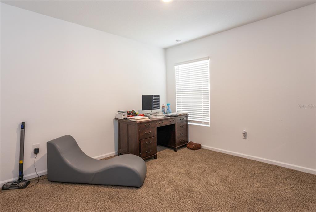 18 Bogey Place Bunnell, FL 32110 - Photo 13 of 40 a view of workspace with furniture