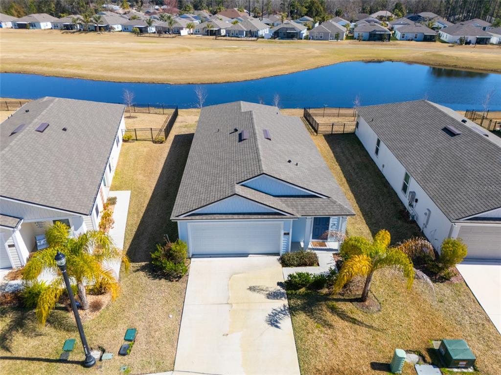 18 Bogey Place Bunnell, FL 32110 - Photo 21 of 40 a view of a swimming pool with an outdoor seating