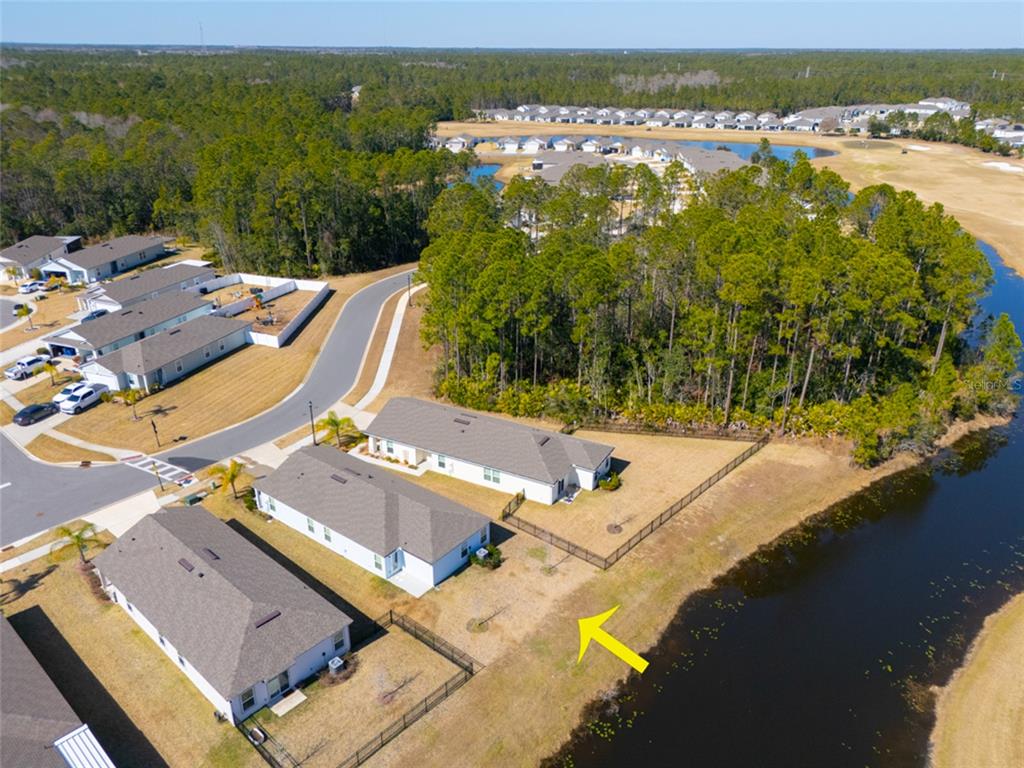 18 Bogey Place Bunnell, FL 32110 - Photo 23 of 40 an aerial view of a house with a lake view
