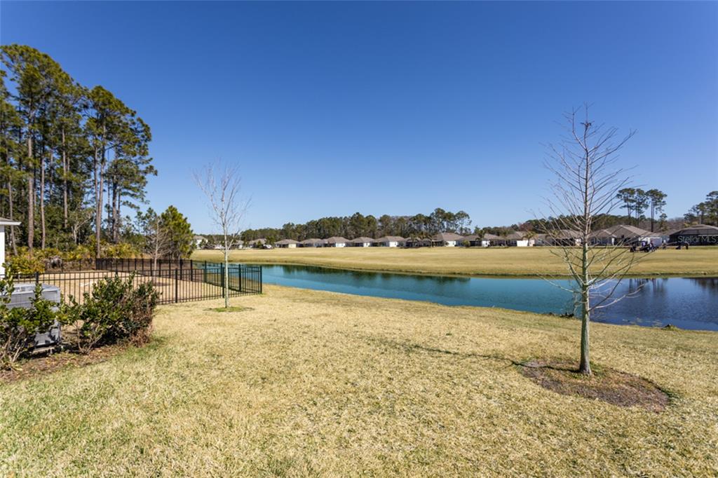 18 Bogey Place Bunnell, FL 32110 - Photo 25 of 40 a view of a lake with a house