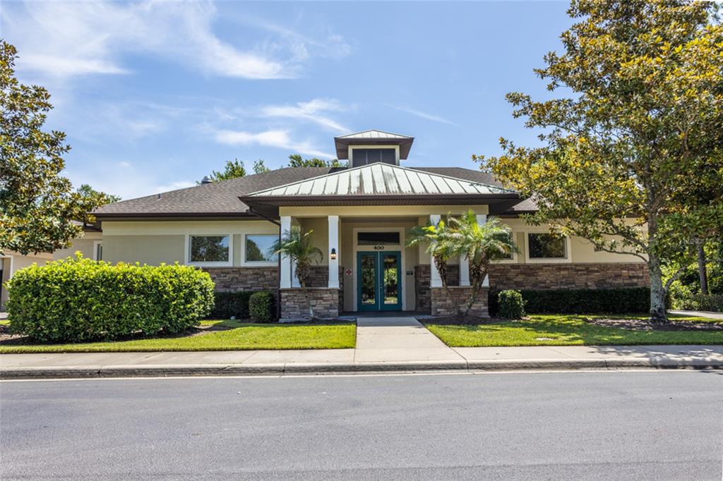 18 Bogey Place Bunnell, FL 32110 - Photo 27 of 40 a view of a house with a swimming pool and a yard