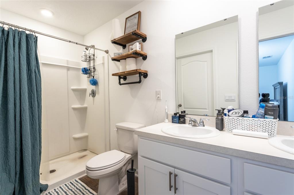 18 Bogey Place Bunnell, FL 32110 - Photo 5 of 40 a bathroom with a sink toilet and shower