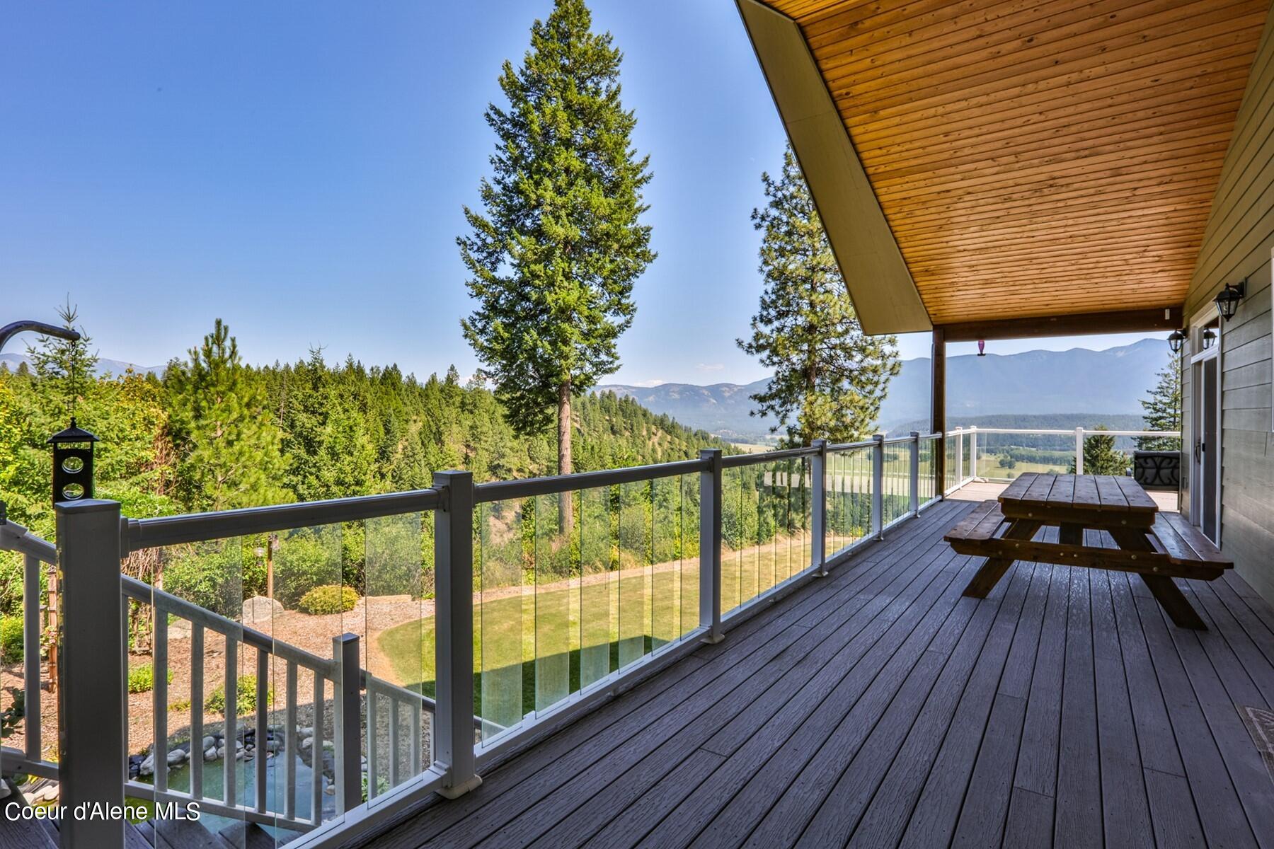 1524 Sunrise Road Bonners Ferry, ID 83805 - Photo 18 of 49 Covered deck on side of home